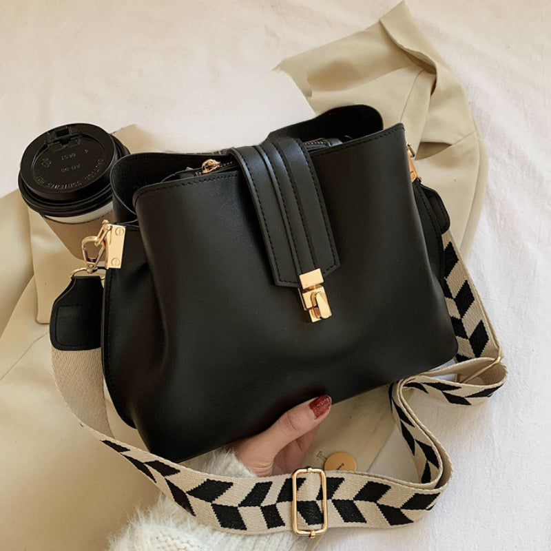 Minimalist Bucket Bag with Geometric Strap