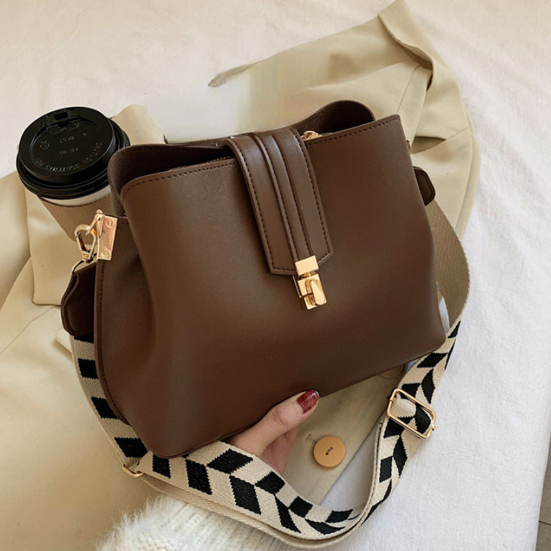 Minimalist Bucket Bag with Geometric Strap