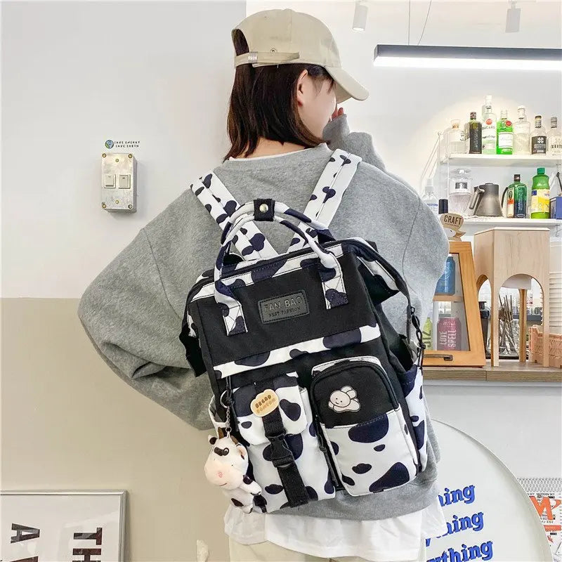 Purple Plaid Cow Pattern Backpack Travel Bag