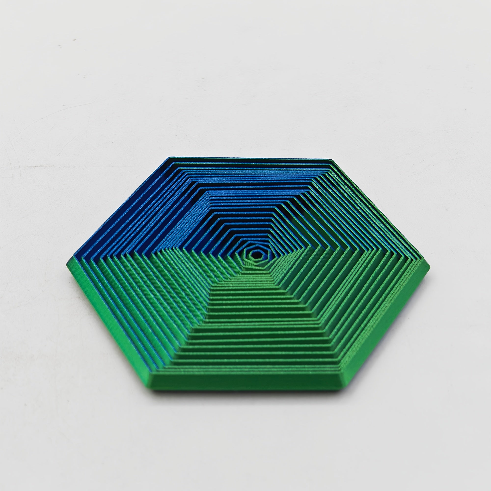 3D Printed Hexagonal Model Glowing at Night