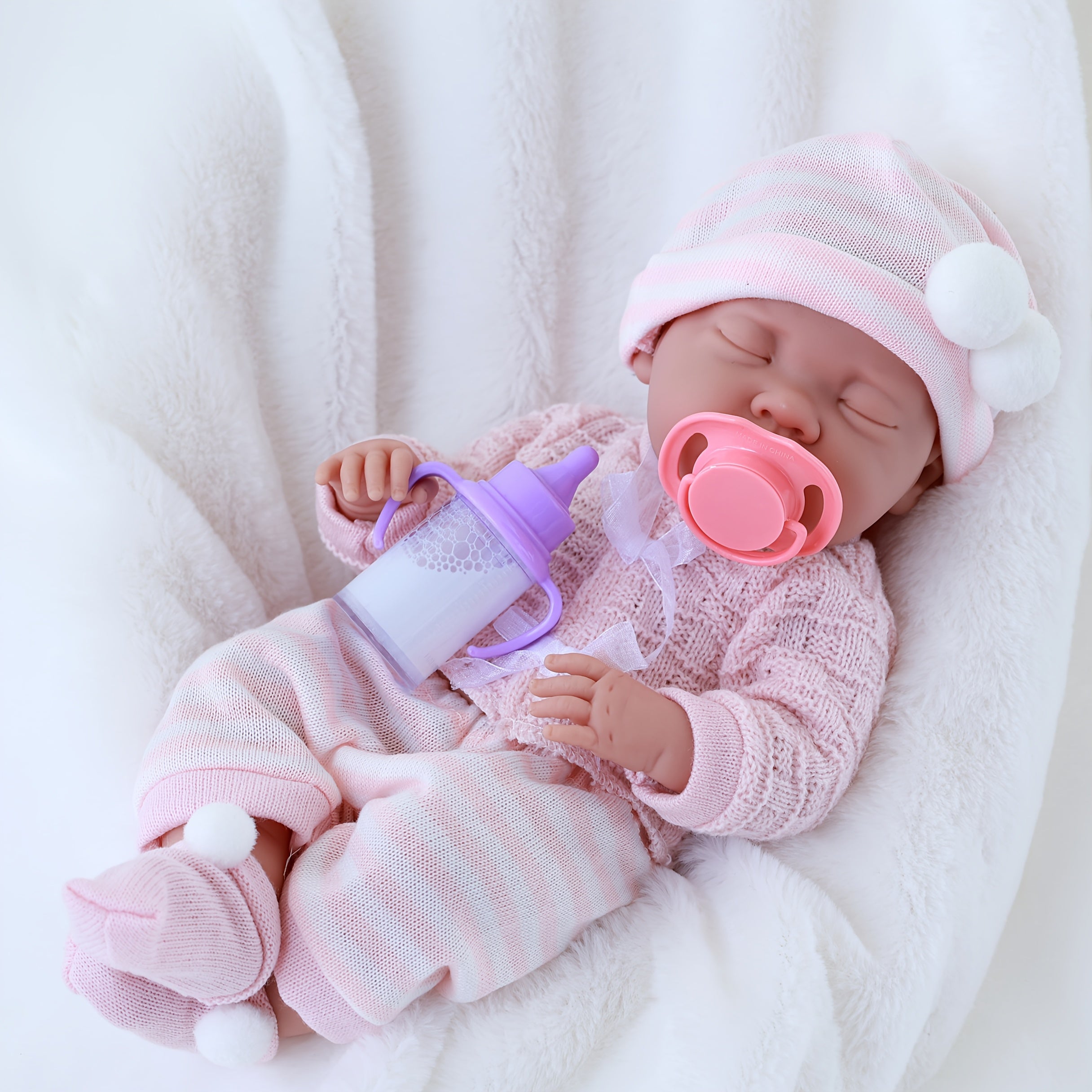 Realistic Reborn Baby Doll in Sleeping Pose with Pink Bunny Outfit