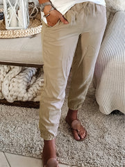  Solid Elastic Drawstring Tapered Leg Pants With Pockets