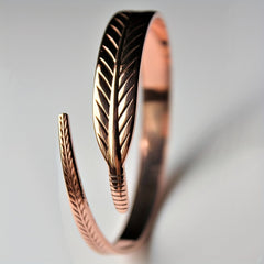 Copper Bangle With Feather Accents - Stylish and Versatile Jewelry Piece