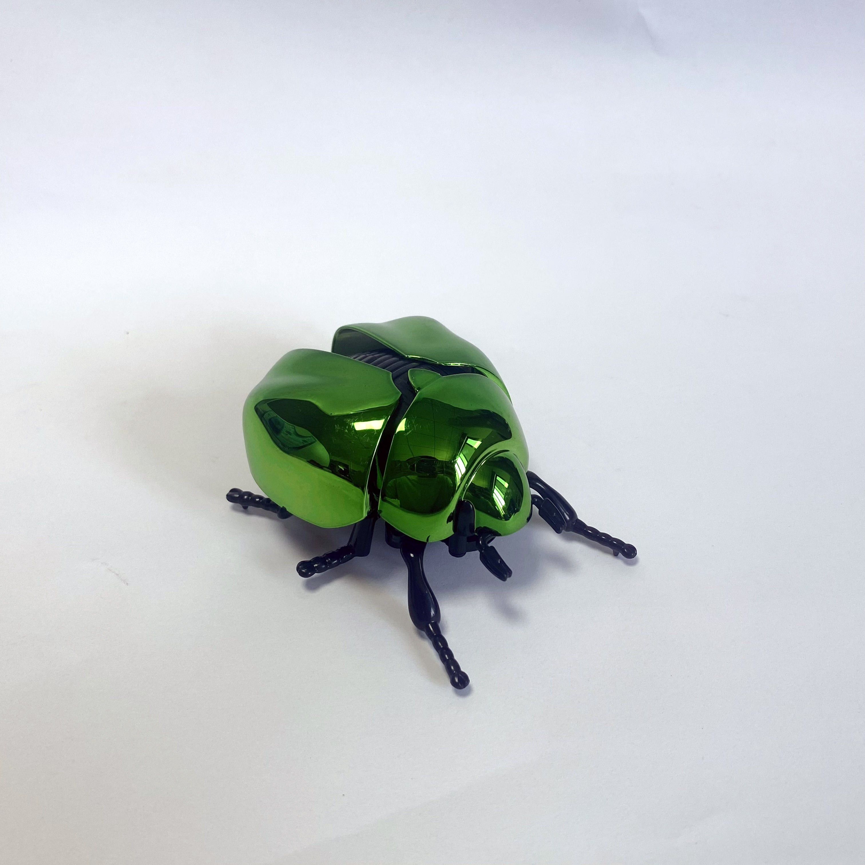 Spring Driven Beetle Toy with Articulated Wings for Home Garden Car