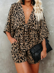  Polka Dot Striped Romper with Deep V Neck