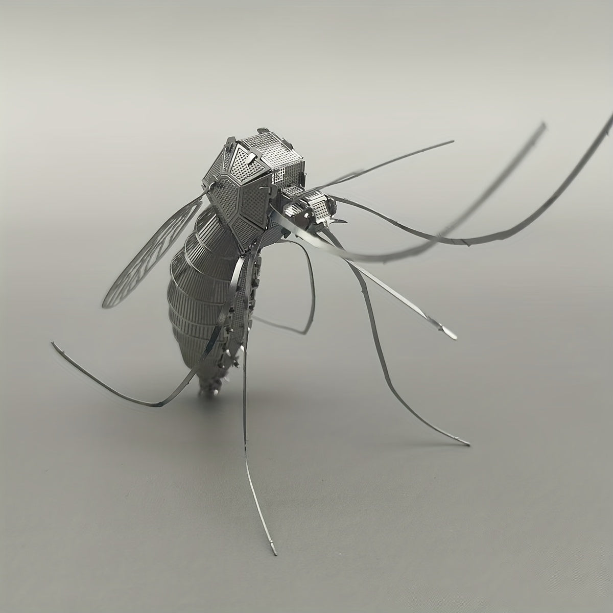 Metallic Mosquito Puzzle Toy for Home Decor & Education