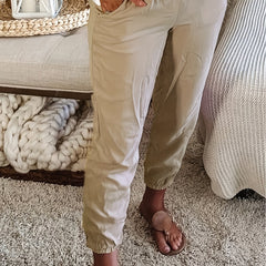  Solid Elastic Drawstring Tapered Leg Pants With Pockets