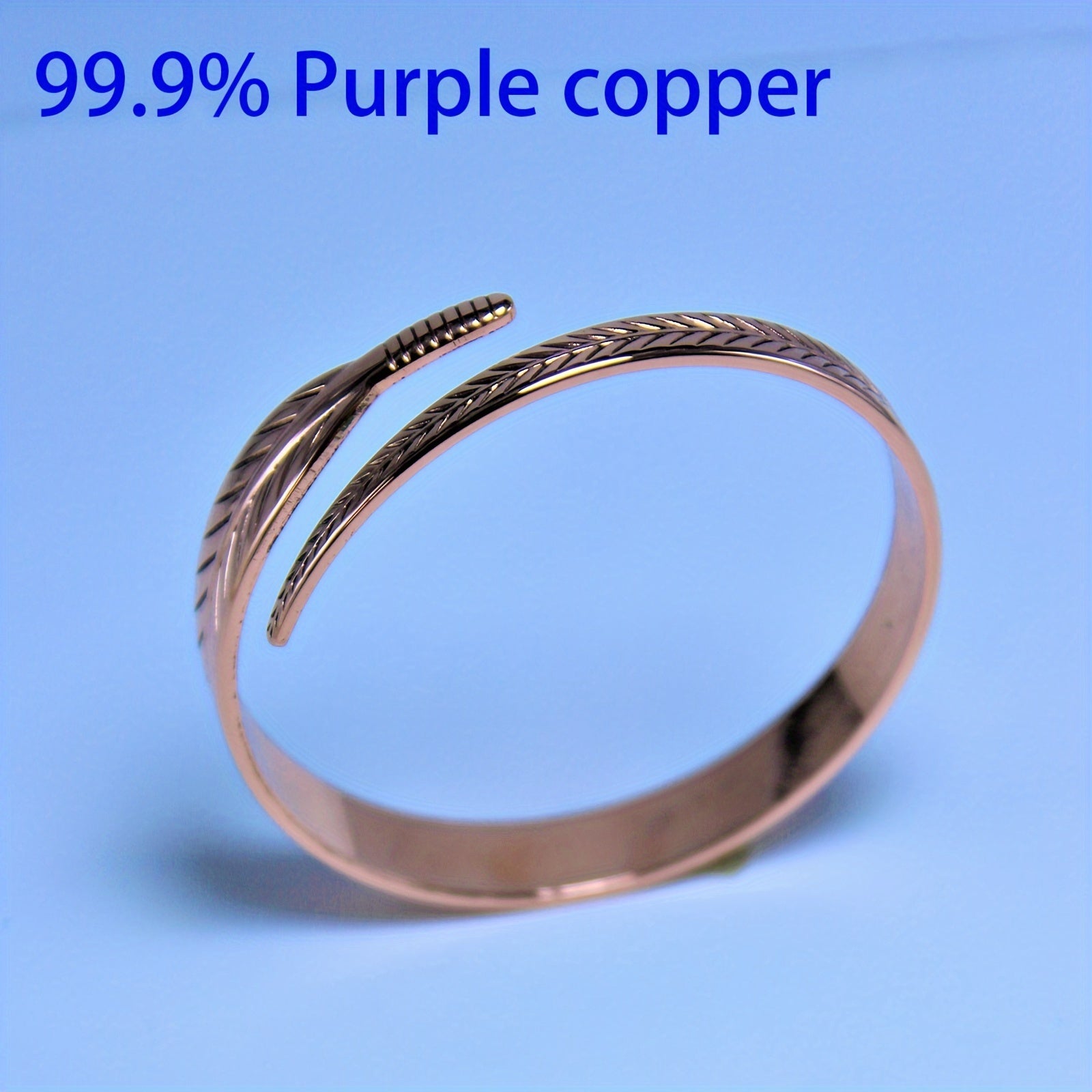 Copper Bangle With Feather Accents - Stylish and Versatile Jewelry Piece