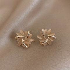 Rotating Flower Cat Eye Stone Sun Stud Earrings