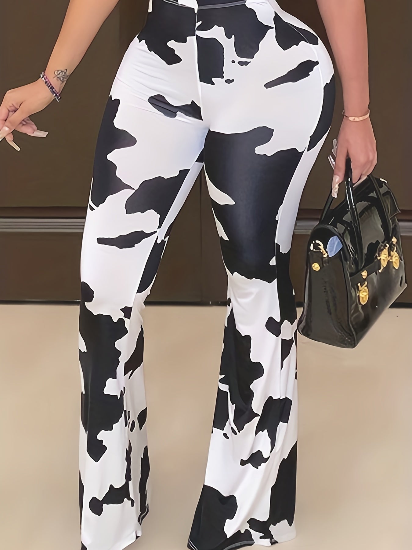 Women's Plus Cow Print Flared Leg Pants