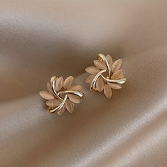 Rotating Flower Cat Eye Stone Sun Stud Earrings