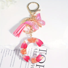 Resin Floral Letter Keychain with Tassel & Butterfly Pendant