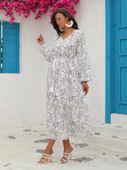  Allover Print Long Sleeve V Neck Maxi Dress With Tassel