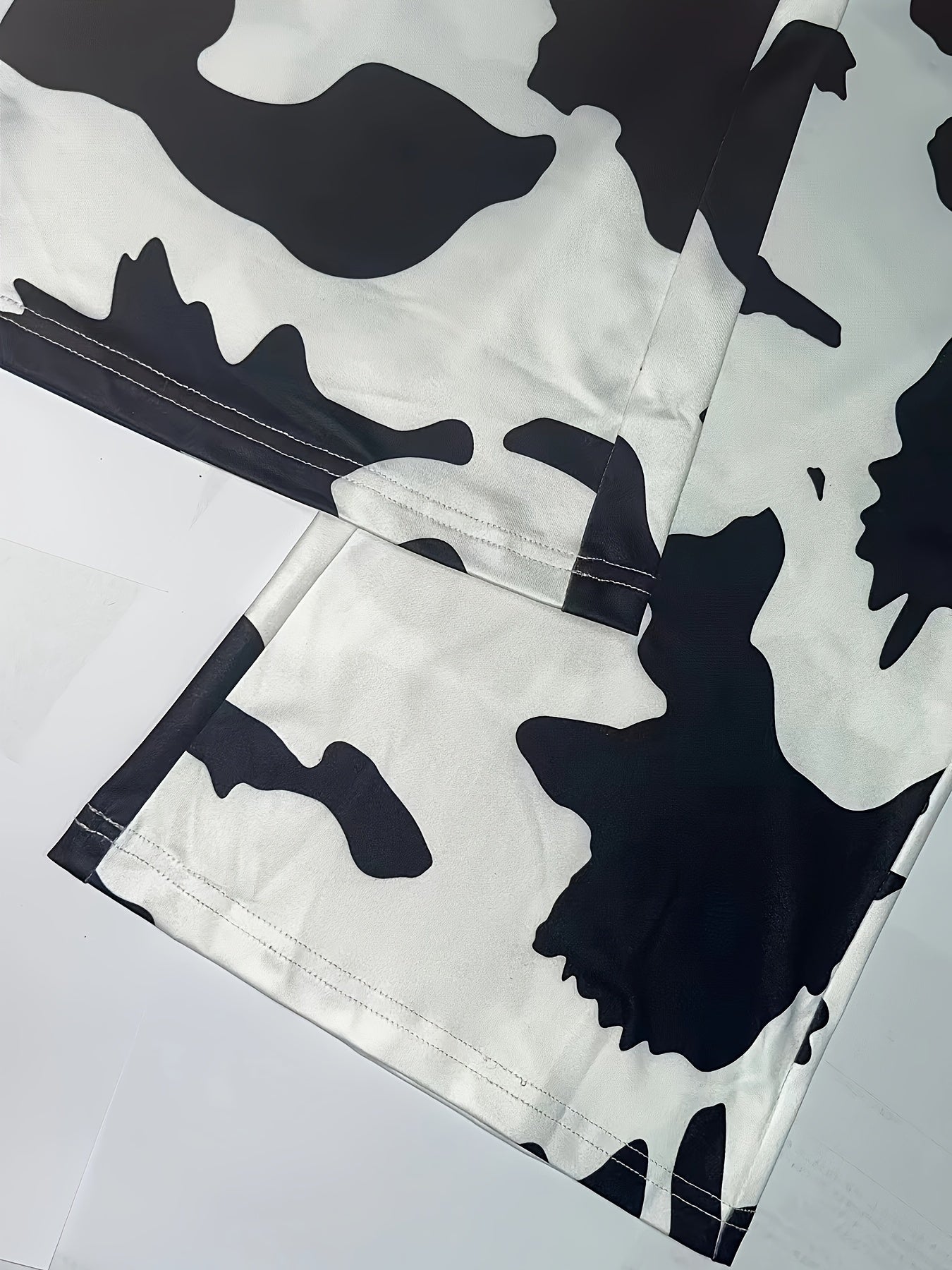 Women's Plus Cow Print Flared Leg Pants