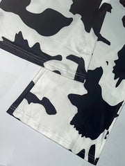Women's Plus Cow Print Flared Leg Pants