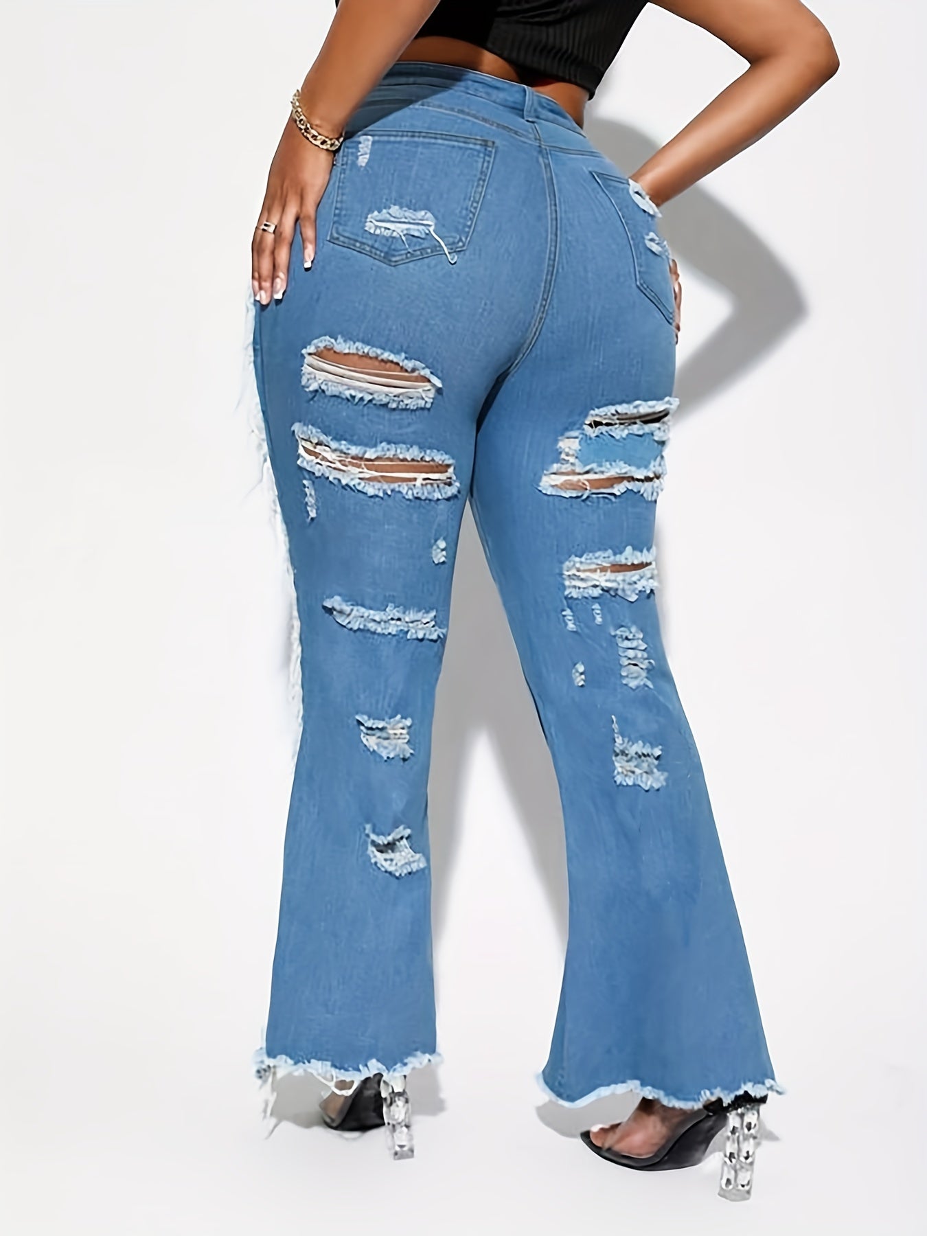  Ripped Fringe Trim Flared Leg Jeans