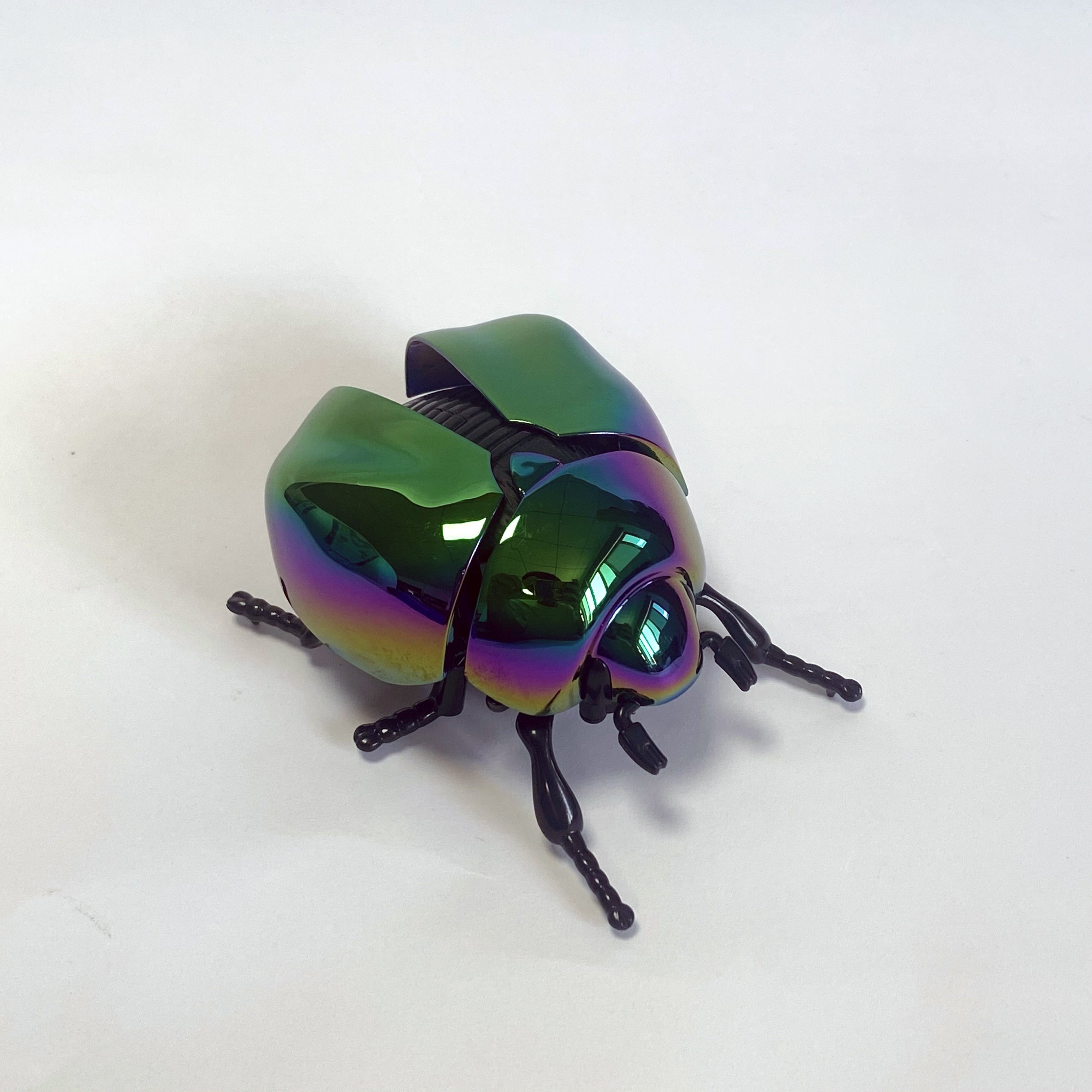 Spring Driven Beetle Toy with Articulated Wings for Home Garden Car