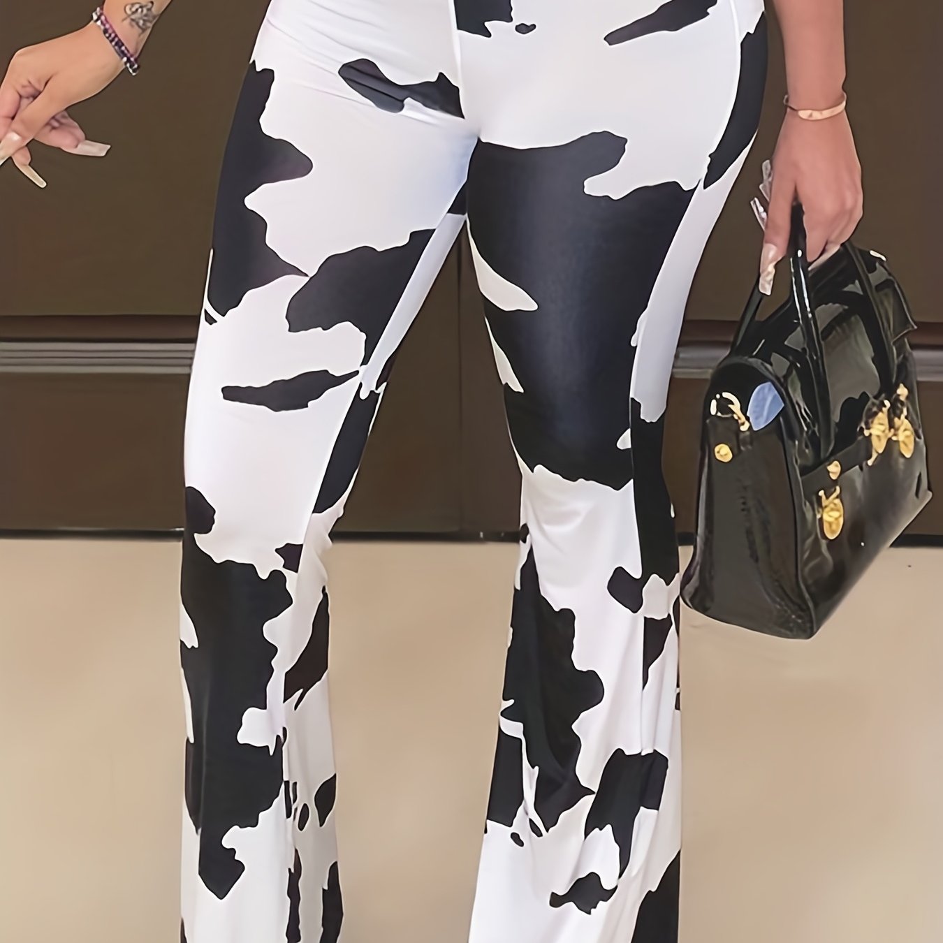 Women's Plus Cow Print Flared Leg Pants