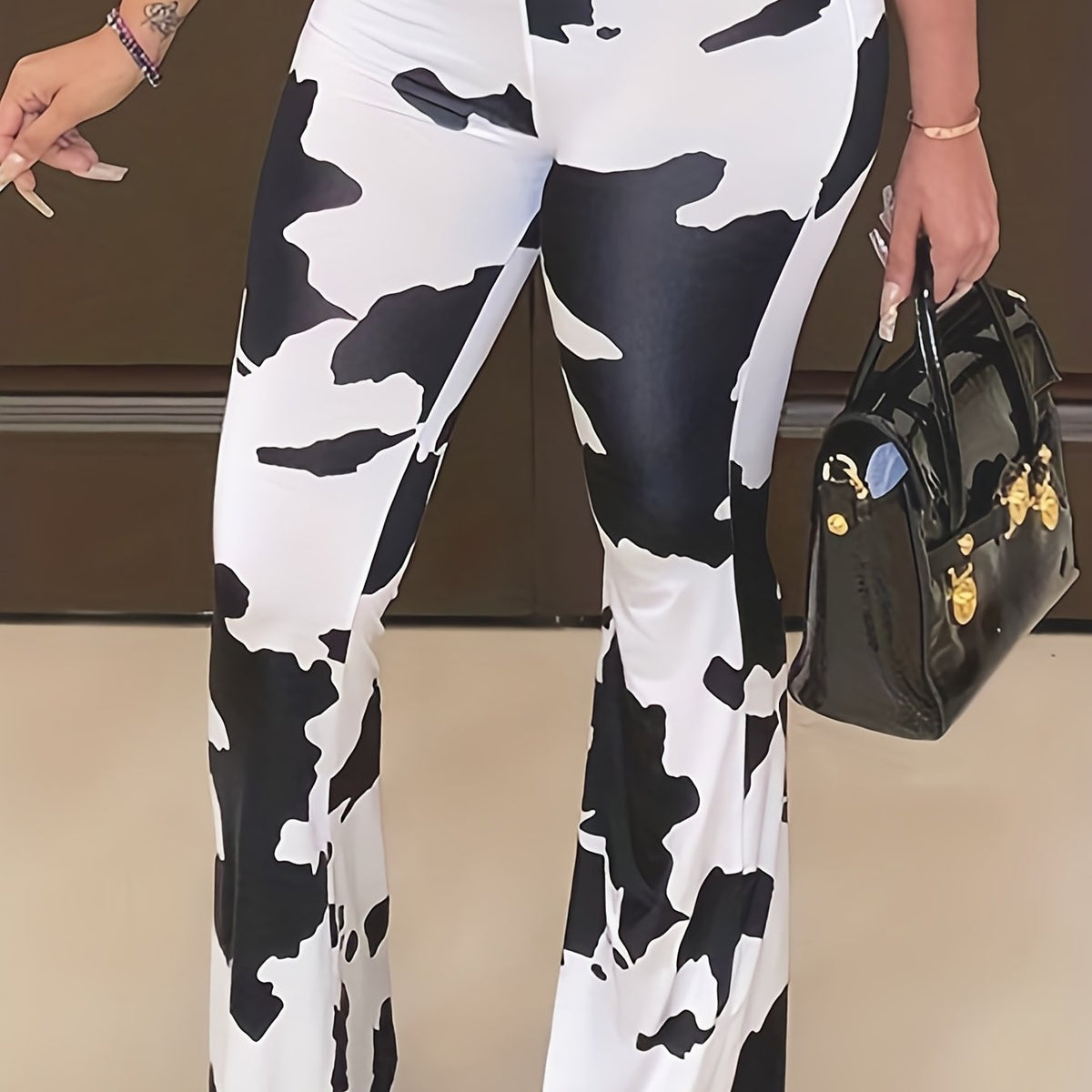 Women's Plus Cow Print Flared Leg Pants