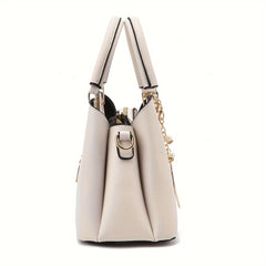 Textured Solid Handbag with Detachable Leaf Pendant