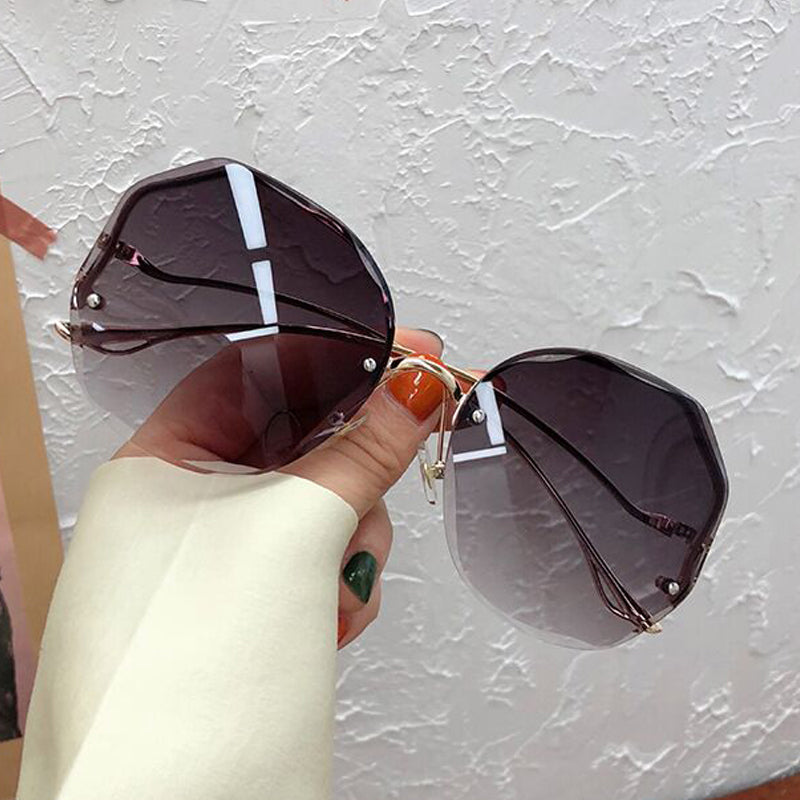 Gradient Round Sunglasses Women Rimless Metal Curved Temples