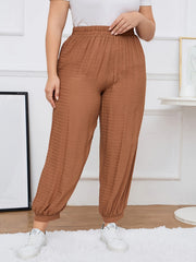  Solid Textured High Rise Jogger Trousers