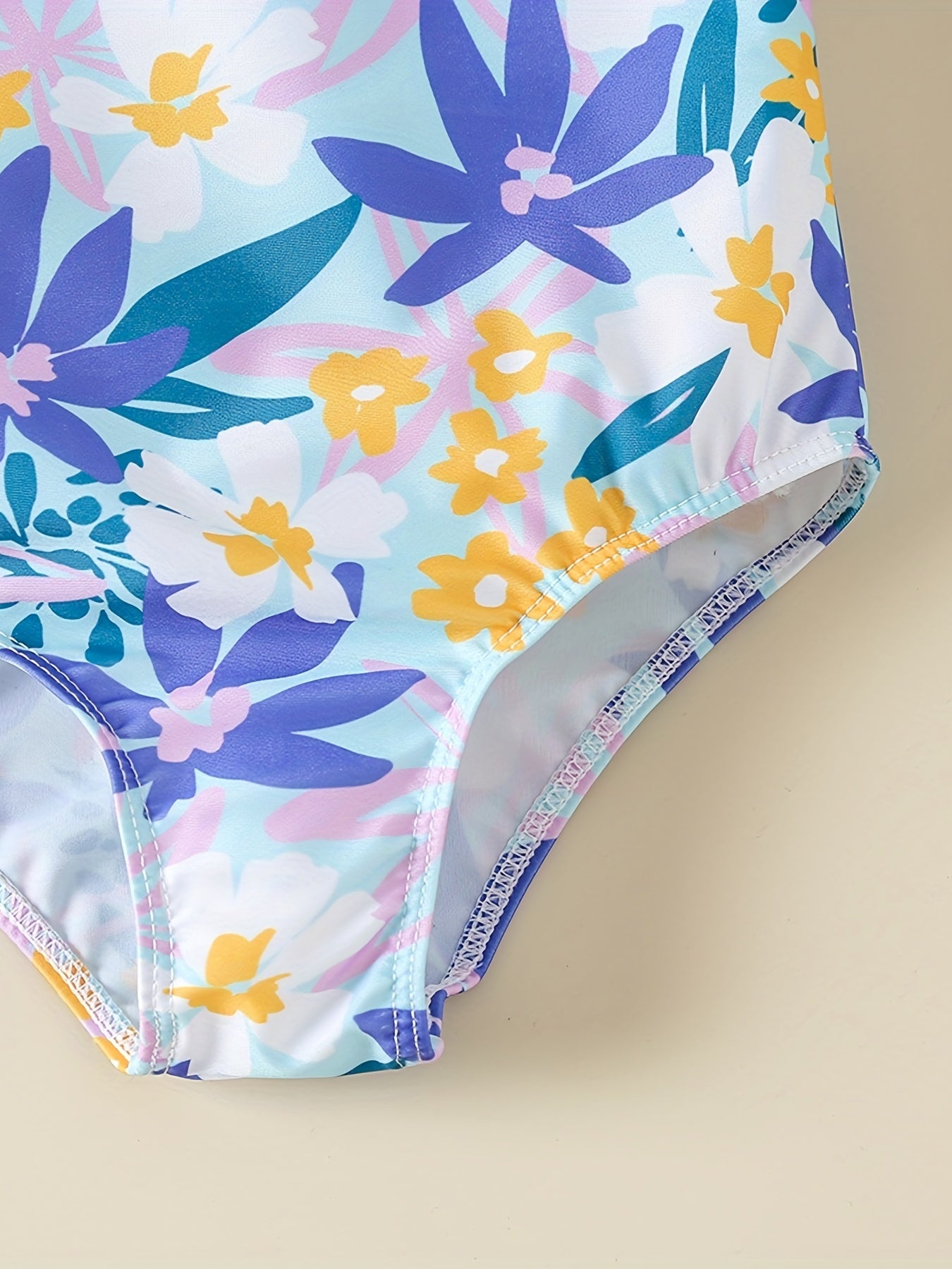 One Shoulder Swimsuit with Flower Graphic and Ruffled Trim