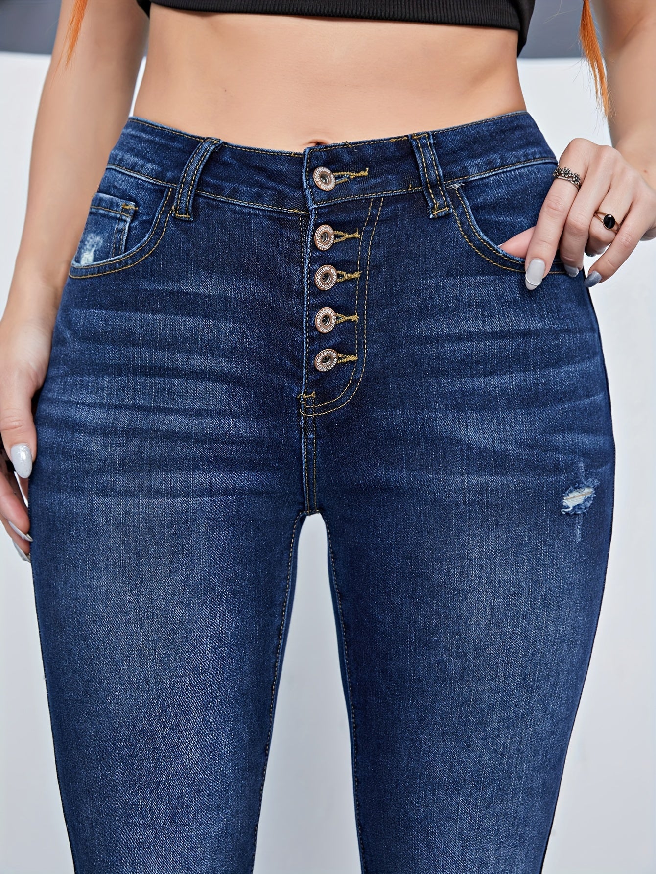  Ripped High Rise Skinny Jeans with Fringe Trim