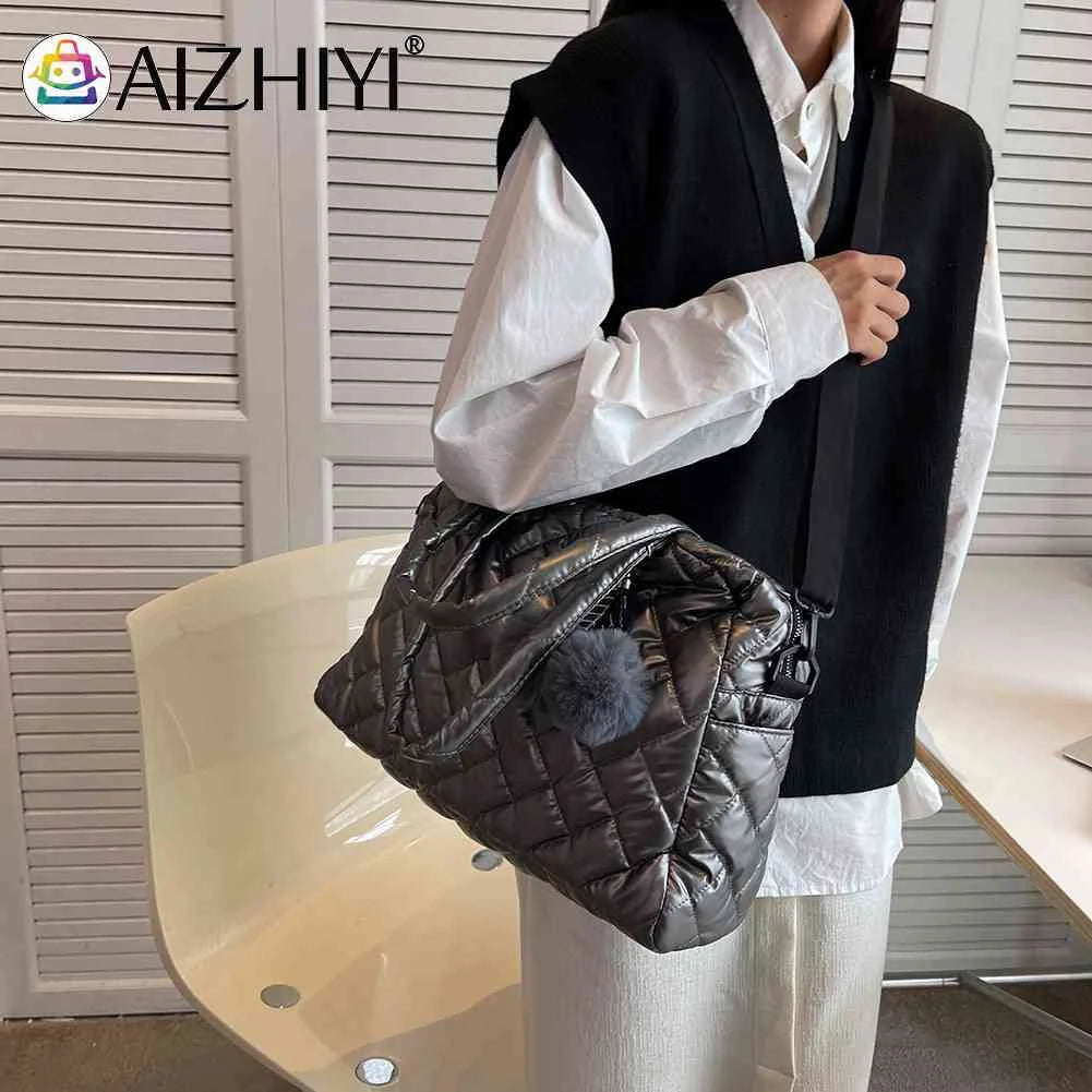 Quilted Shoulder Bag with Pompom Pendant