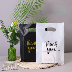 100pcs And Gift Bag Four finger Clothing Bag Packaging Bag Portable Shopping Bag