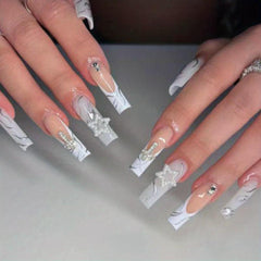 Grayish French Press Nails with Swirl Designs and Star Charms