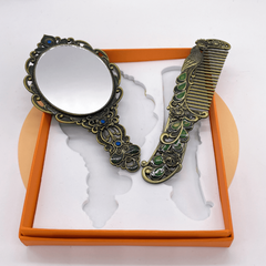 Vintage Peacock Embossed Makeup Mirror & Hair Comb Set