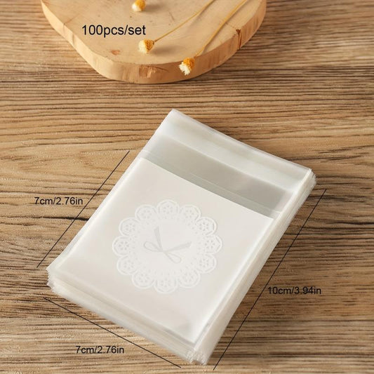 100pcs Bow Pattern Self Adhesive Treat Bags Clear Plastic Goodie Bags