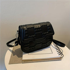 Geometric Embossed Flap Saddle Bag