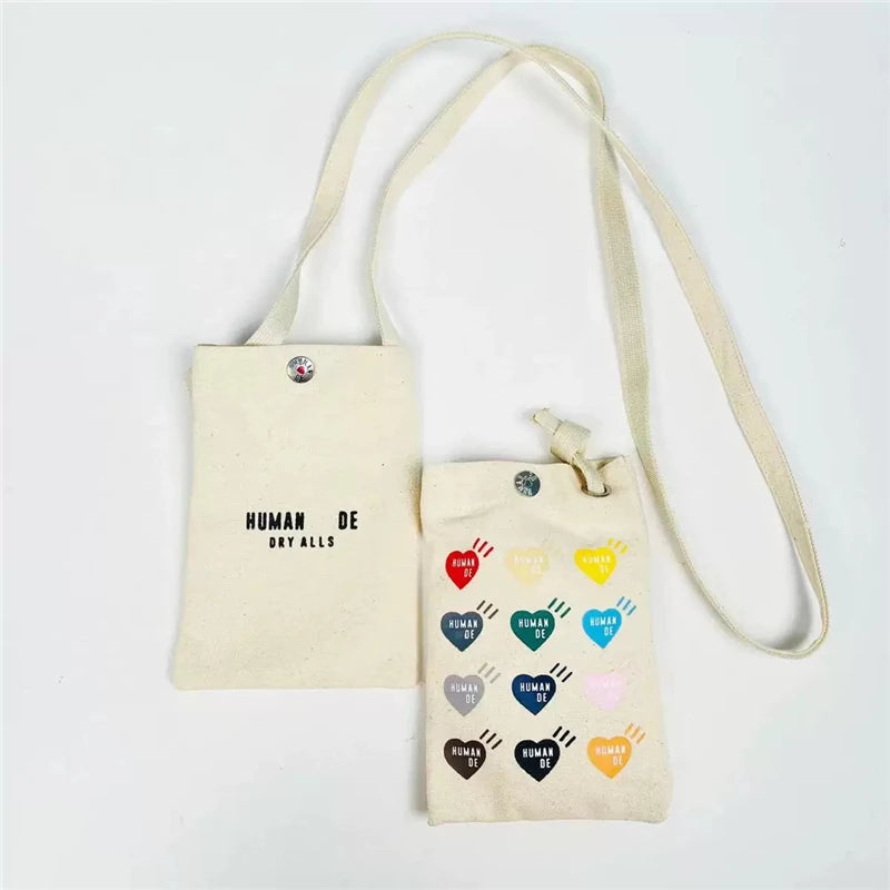 Canvas HUMAN Bag Men Women Top Version Couple Shoulder Messenger Bag
