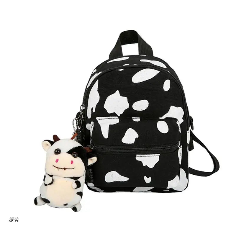 D0UD Mini Canvas Daypack with Plush Pendant Cow Print Backpack for Women