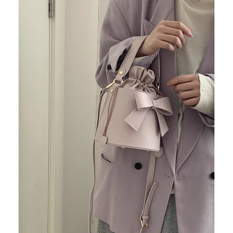 Leather Crossbody Bag With Bow Ornaments