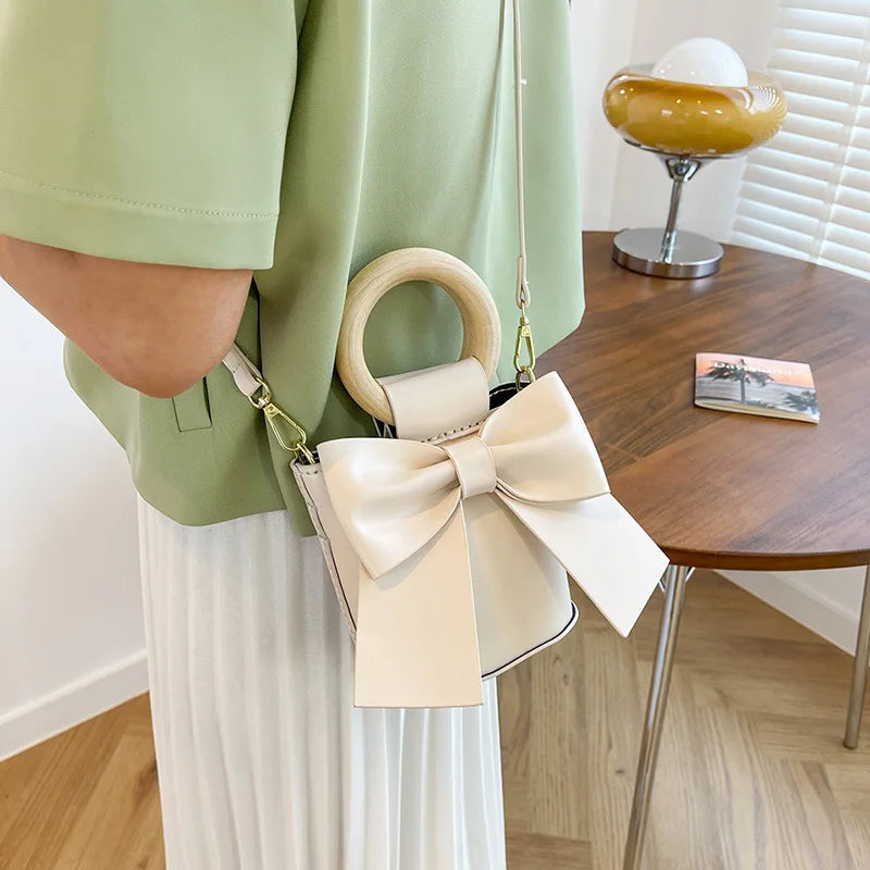 DIY Material Wrapped Hand-Sewn Bow Bucket Bag