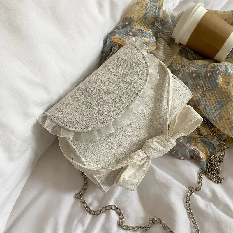 Embossed Lace Up Bow Handle Women Shoulder Bag