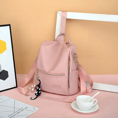 Female Backpack, Contrast Shoulders Bag Handbag with Cartoon Pendant in Wine Red