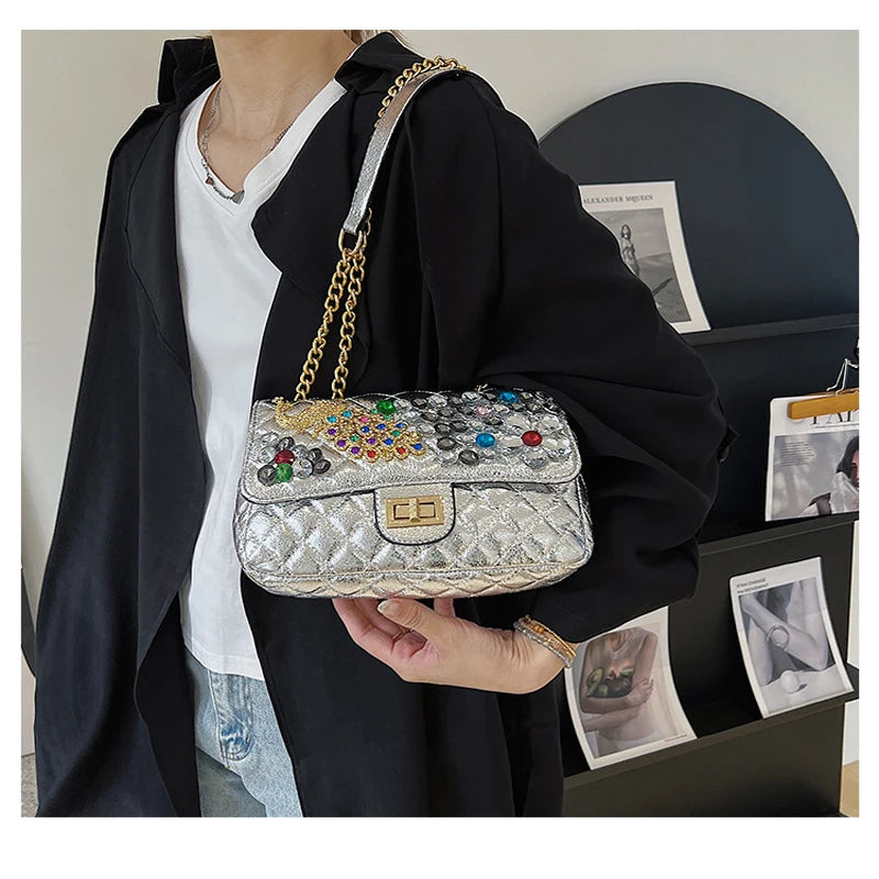 Solid Diamond Inlaid Leather Crossbody Bag with Peacock Chain