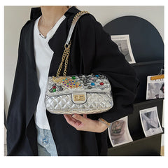Solid Diamond Inlaid Leather Crossbody Bag with Peacock Chain