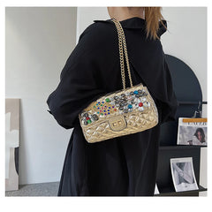 Solid Diamond Inlaid Leather Crossbody Bag with Peacock Chain