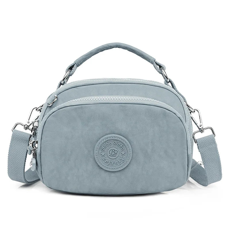 Qiaoduo Small Canvas Shoulder Bag Multi-compartment Portable Mom Phone Bag