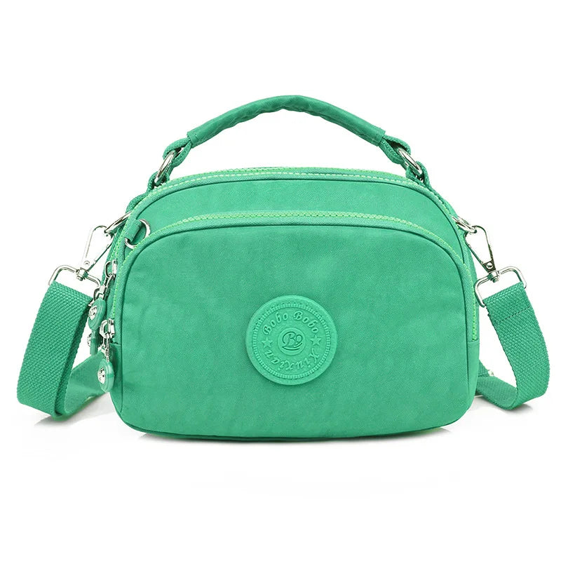 Qiaoduo Small Canvas Shoulder Bag Multi-compartment Portable Mom Phone Bag