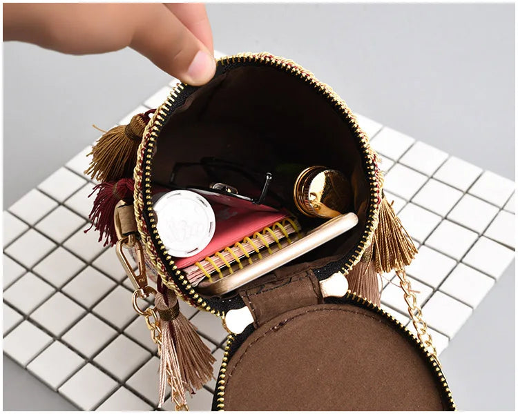 Wild Grass Woven Shoulder Bag with Chain Strap and Tassel