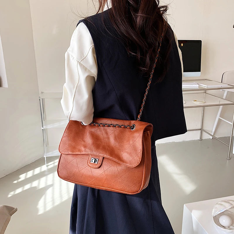 Vegan Leather Quilted Crossbody Bag with Chain Strap & Tassel