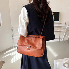 Vegan Leather Quilted Crossbody Bag with Chain Strap & Tassel