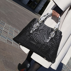 Floral Embossed Leather Tote Bag with Snake Print Handles