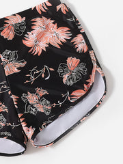 Sporty Plus Size Bikini Set: Solid Halter Bra & Floral Print Shorts